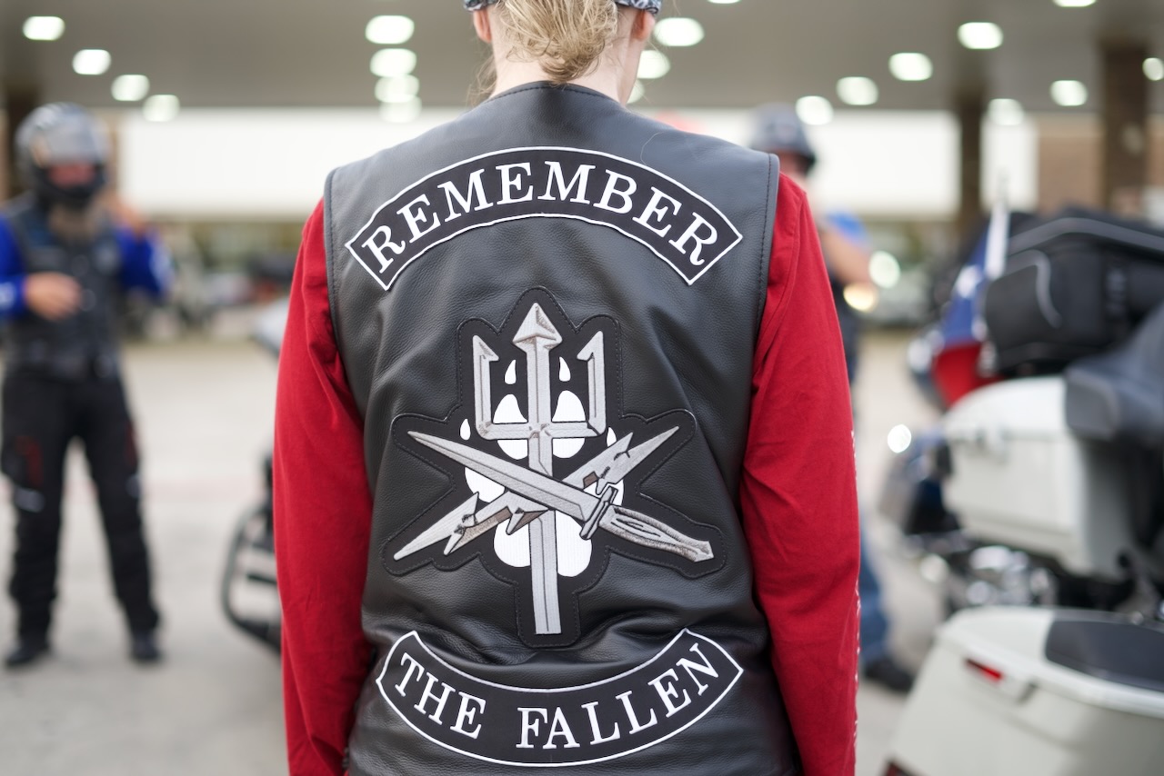 Remember the Fallen branded jacket showcasing commemorative merchandise