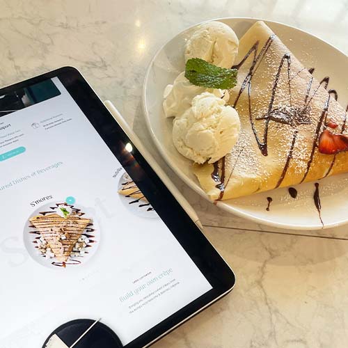 Sweet Paris website visual design displayed on an iPad