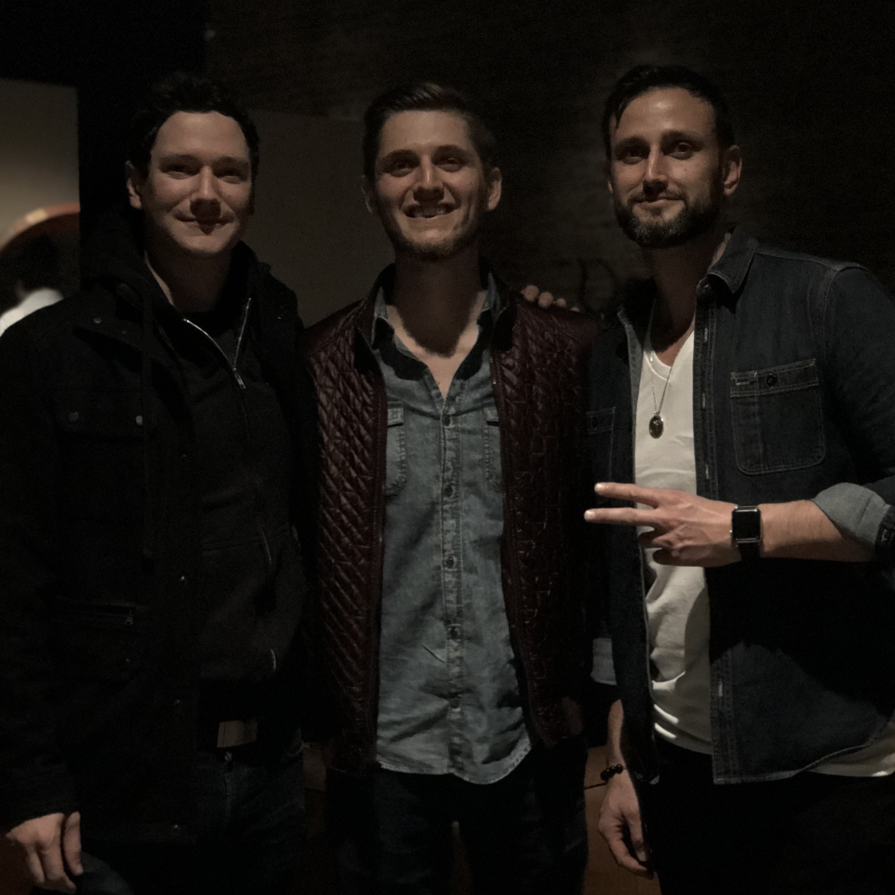 Cofounders CEO Phil Sitter, Creative Director Adam Lamprect-morphew, & technology developer Ricky Lee LaPraim of a rewards platform app posing together at a launch dinner which eventually became RepeatMD