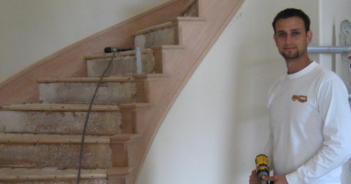 Ricky Lee LaPraim assisting with a custom staircase build.